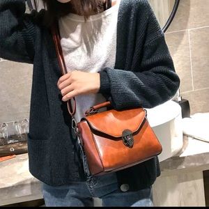 Brown Cross body top handle bag